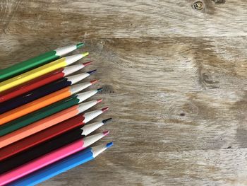 High angle view of multi colored pencils on table