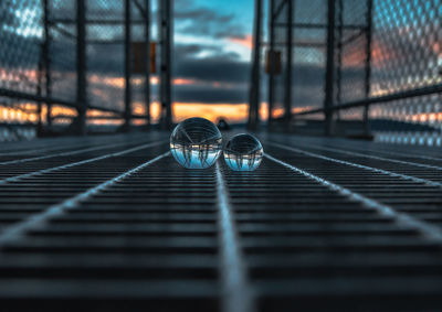 Lensball shot on metal bridge