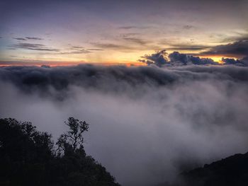 Scenic view of silhouette mountains against sky during sunset