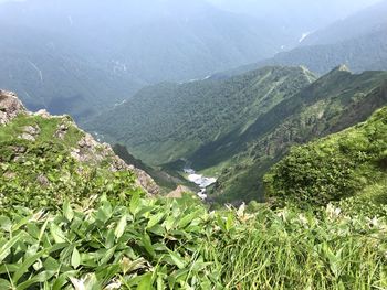 Scenic view of valley and mountains
