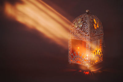 Traditional arabic lantern lit up for celebrating ramadan, the holy month for whole muslim world