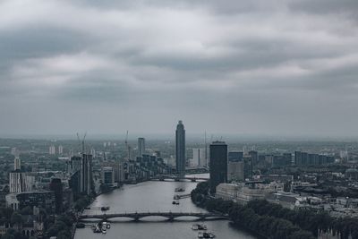 High angle view of city against cloudy sky