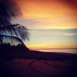 Scenic view of sea against sky at sunset