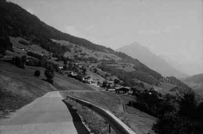 Scenic view of landscape and mountains against sky