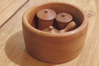 High angle view of wooden container on table