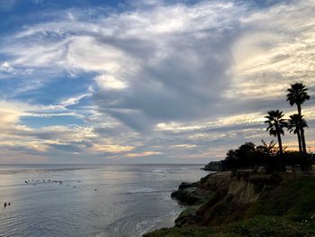 Scenic view of sea against sky at sunset