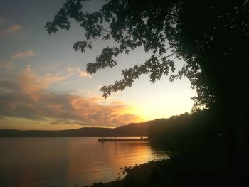 Scenic view of sunset over lake