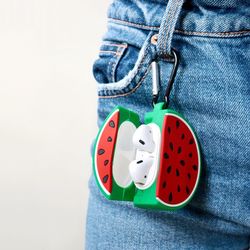 Close-up of man holding toy against white background