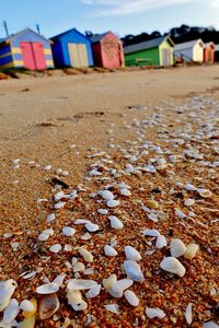 Close-up of multi colored sand on beach