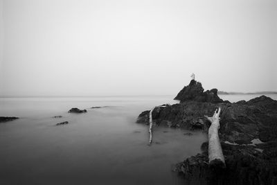 Scenic view of sea against clear sky