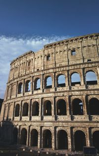 Street journals-facade low angle view of colosseum against sky