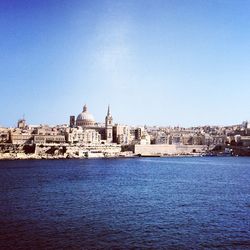 View of river with buildings in background