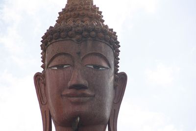 Low angle view of statue against sky