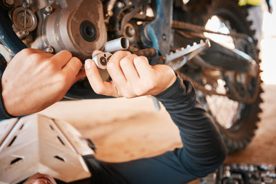 Low section of man working in workshop