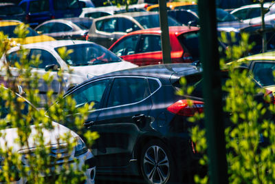 Close-up of motorcycle in parking lot