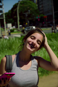 Portrait of young woman smiling