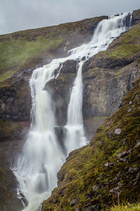 Rjukandafoss waterfalls are impressively big   go hike to get up closer during an icelandic summer