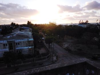 High angle view of buildings against sky during sunset