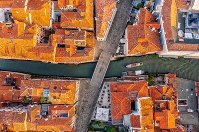 Aerial view of venice, san polo, italy. amazing city view from above on building roofs and canals