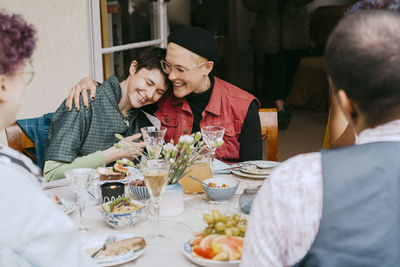 Friends having food at restaurant