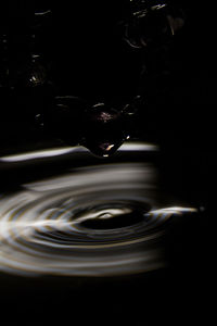 Close-up of water over black background