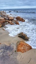 Scenic view of beach against sky