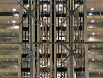 Low angle view of illuminated building at night