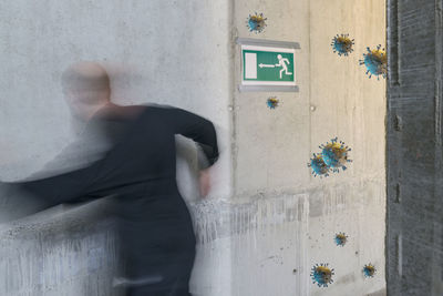 Shadow of man on wall of building