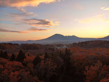 Scenic view of mountains against sky during sunset
