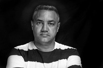 Close-up portrait of a serious young man