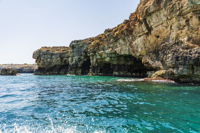 Scenic view of sea against clear sky