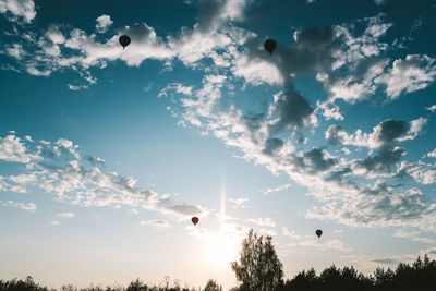 Low angle view of hot air balloons against sky