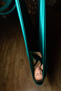 High angle view of shoes on wooden floor