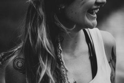 Midsection of smiling woman