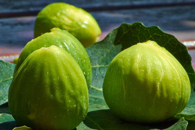 Close-up of wet lemon on table