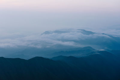 Scenic view of mountains against sky during sunset