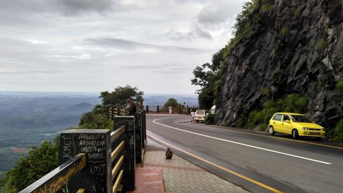 Road against cloudy sky