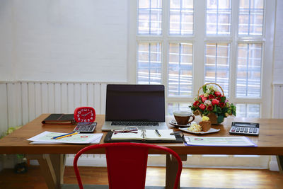 Potted plant on table at home