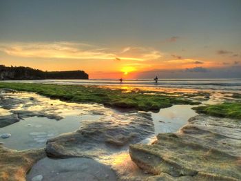 Scenic view of sunset over sea