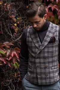 Close-up of man in jacket standing outdoors