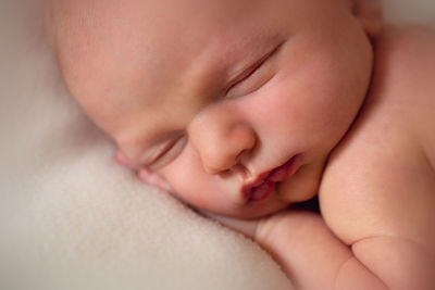 Close up of newborn baby boy sleeping