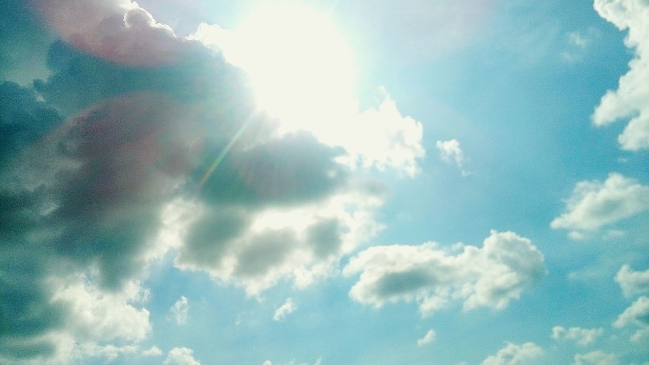 low angle view, sky, beauty in nature, tranquility, scenics, tranquil scene, cloud - sky, nature, cloudscape, majestic, day, blue, cloud, sky only, heaven, outdoors, bright, fluffy, ethereal, meteorology, cloudy, cumulus cloud, no people, atmospheric mood, softness, non-urban scene