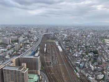 High angle view of street amidst buildings in city