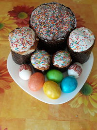 High angle view of multi colored candies on table