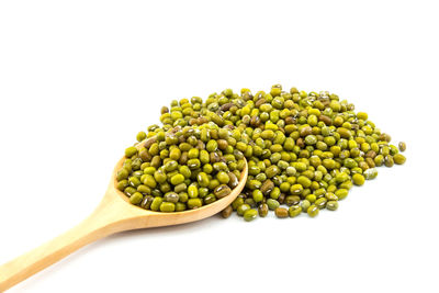 Close-up of green beans against white background