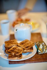 English breakfast with toasts, tea, tomatoes etc