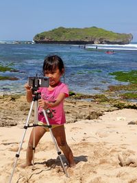 Full length of girl on beach