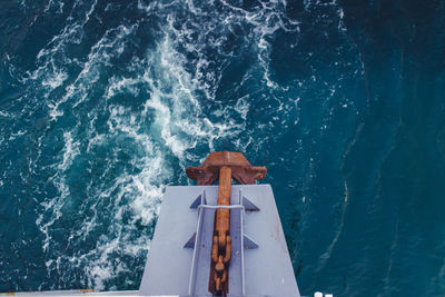 High angle view of ship sailing in sea