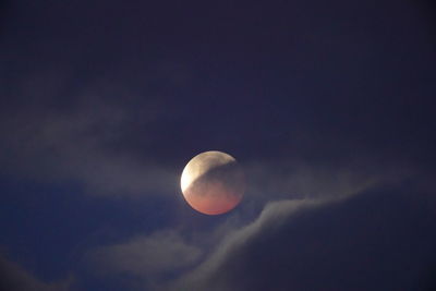 Low angle view of moon against sky