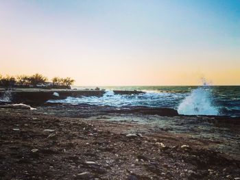 Scenic view of sea against clear sky